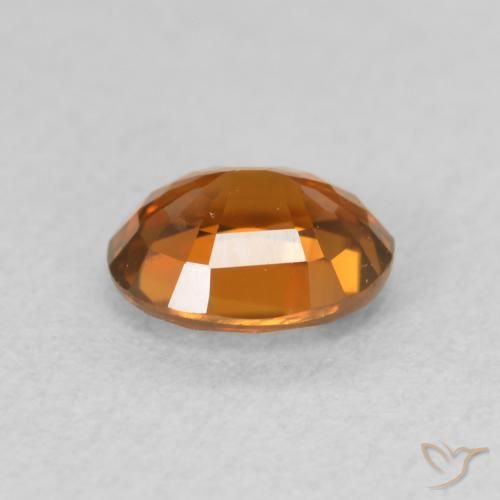 Zircon Orange foncé naturelle ovale, 1.03 ct, VVS-VS