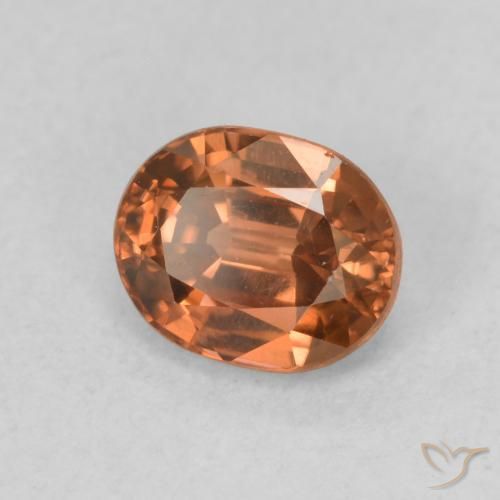 Zircon Orange foncé naturelle ovale, 1.06 ct, VS