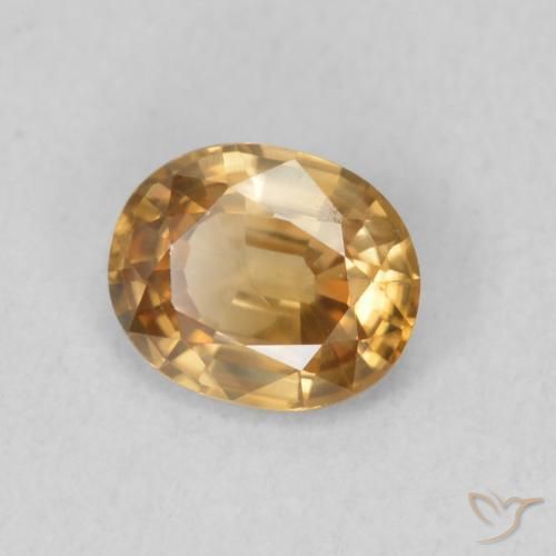 Zircon Or moyen naturelle ovale, 0.82 ct, VS