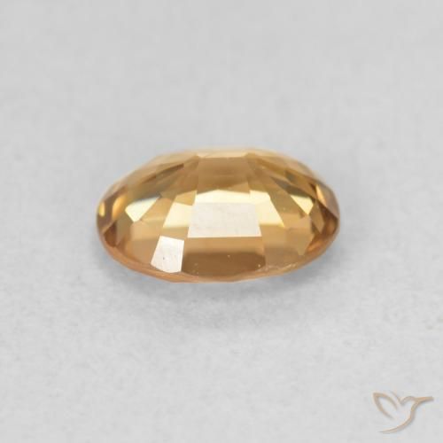 Zircon Or moyen naturelle ovale, 0.82 ct, VS