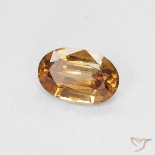 Zircon Orange rouille naturelle ovale, 0.66 ct, VVS