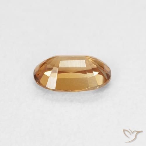 Zircon Orange rouille naturelle ovale, 0.66 ct, VVS