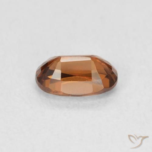 Zircon Medium Dark-Orange naturelle ovale, 0.82 ct, VVS