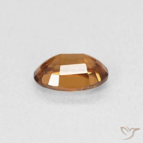 Zircon Orange brun naturelle ovale, 0.72 ct, VVS