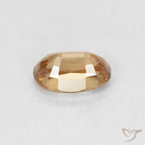 Zircon Orange rouille naturelle ovale, 0.84 ct, VVS