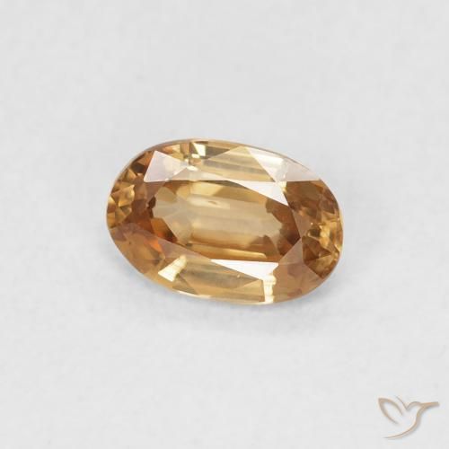 Zircon Pêche doré naturelle ovale, 0.66 ct, VVS