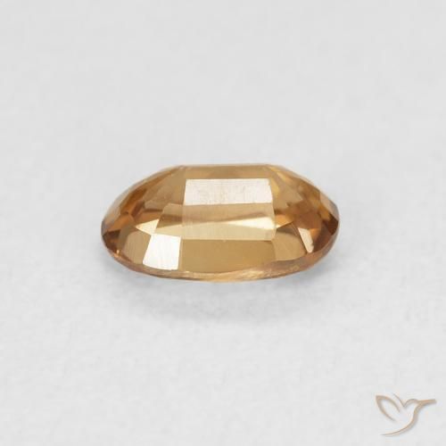 Zircon Orange brunâtre naturelle ovale, 0.74 ct, VVS-VS