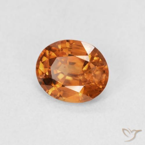 Zircon Orange foncé naturelle ovale, 0.91 ct, VS