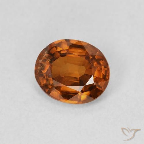 Zircon Orange foncé naturelle ovale, 0.86 ct, VS