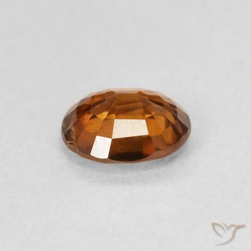 Zircon Orange foncé naturelle ovale, 0.86 ct, VS