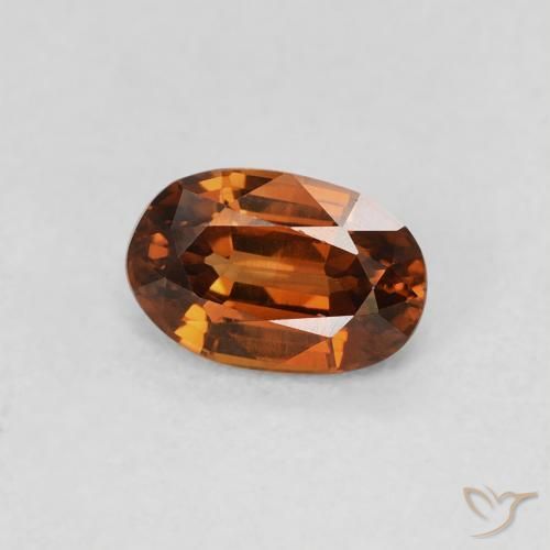 Zircon Ambre orange naturelle ovale, 0.78 ct, VS