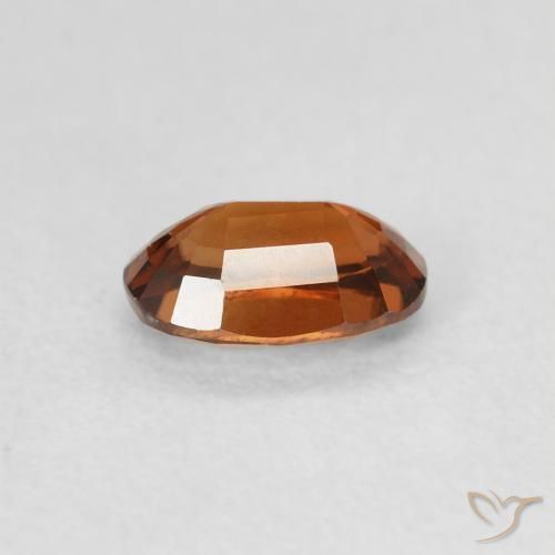 Zircon Ambre orange naturelle ovale, 0.78 ct, VS