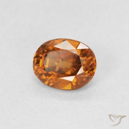 Zircon Orange foncé naturelle ovale, 0.61 ct, VS