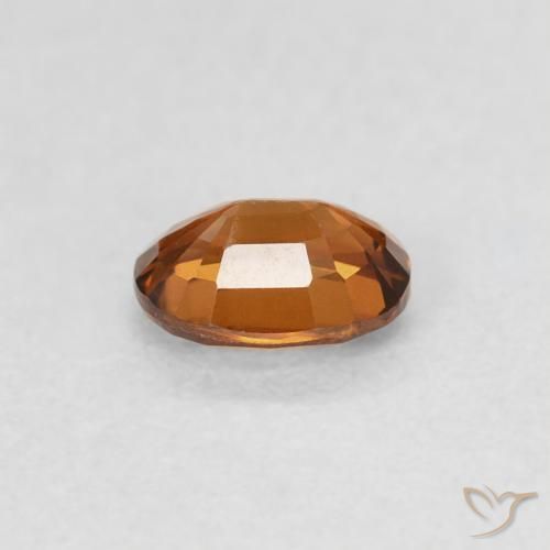 Zircon Medium Dark-Orange naturelle ovale, 0.60 ct, VS