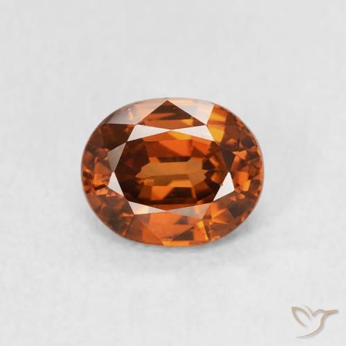 Zircon Orange rougeâtre naturelle ovale, 1.01 ct, VVS