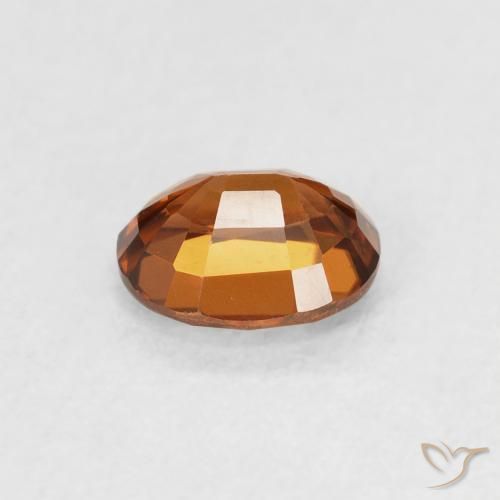 Zircon Orange rougeâtre naturelle ovale, 1.01 ct, VVS