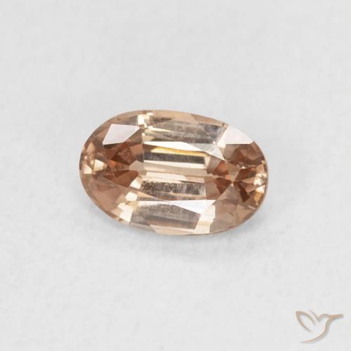 Zircon Rose orangé léger naturelle ovale, 0.72 ct, VVS