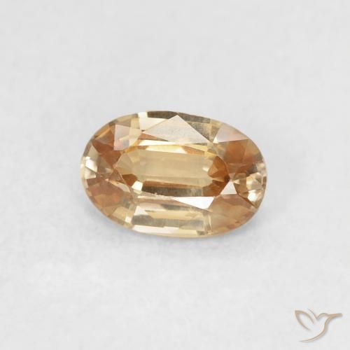 Zircon Orange-doré naturelle ovale, 0.66 ct, VVS