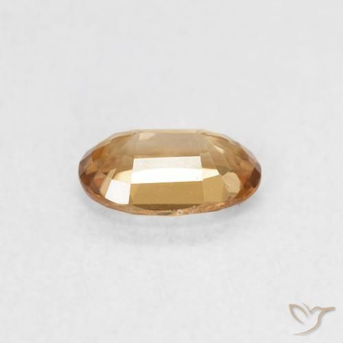 Zircon Orange-doré naturelle ovale, 0.66 ct, VVS