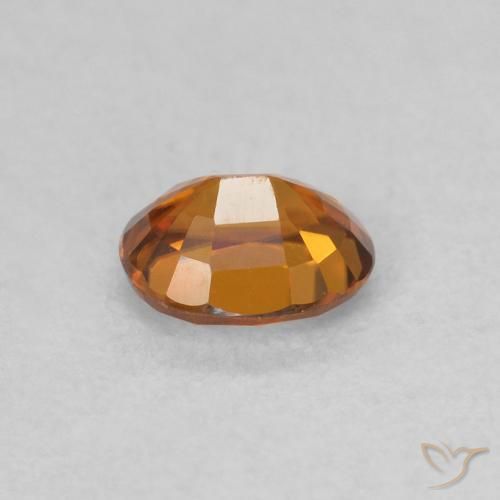 Zircon Medium Dark-Orange naturelle ovale, 0.62 ct, VVS