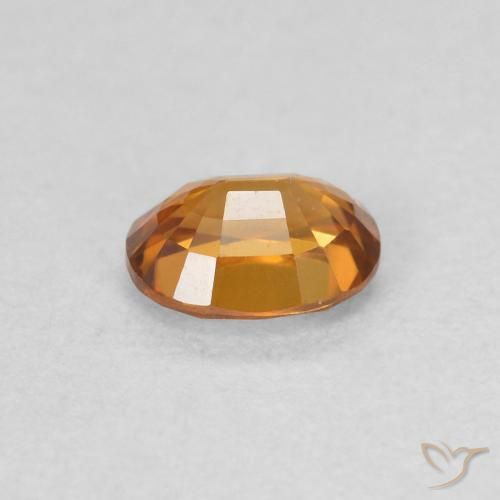 Zircon Orange brun naturelle ovale, 0.61 ct, VVS
