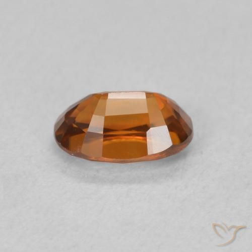 Zircon Orange foncé naturelle ovale, 0.84 ct, VVS