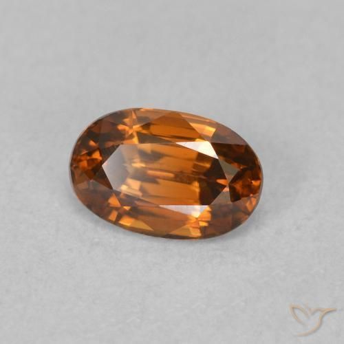 Zircon Medium Dark-Orange naturelle ovale, 0.78 ct, VVS