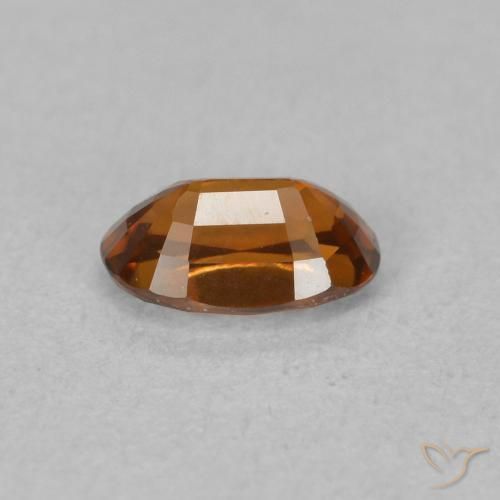 Zircon Medium Dark-Orange naturelle ovale, 0.78 ct, VVS