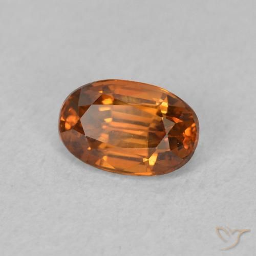 Zircon Medium Dark-Orange naturelle ovale, 0.81 ct, VVS