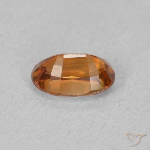 Zircon Medium Dark-Orange naturelle ovale, 0.81 ct, VVS