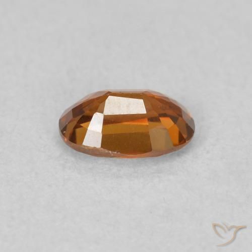 Zircon Medium Dark-Orange naturelle ovale, 0.73 ct, VVS