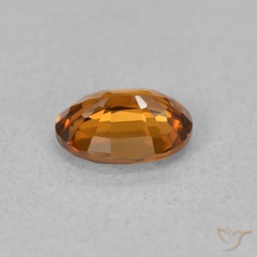 Zircon Orange moyen naturelle ovale, 0.86 ct, VVS