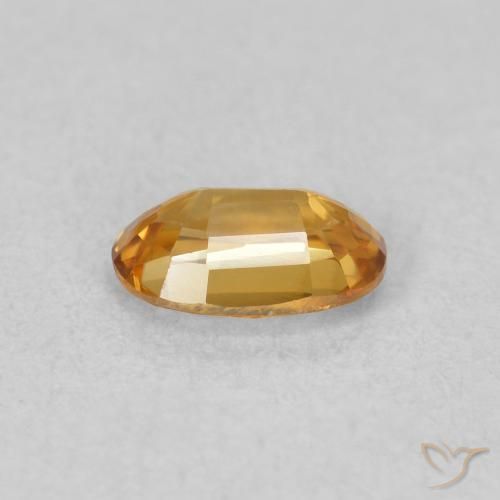 Zircon Orange foncé naturelle ovale, 0.70 ct, VVS