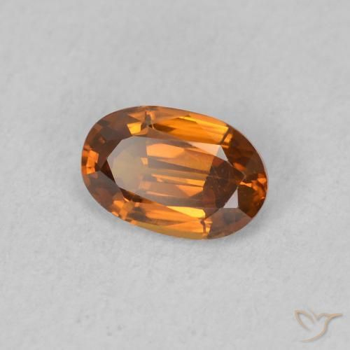 Zircon Orange moyen naturelle ovale, 0.68 ct, VVS