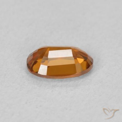 Zircon Orange moyen naturelle ovale, 0.68 ct, VVS