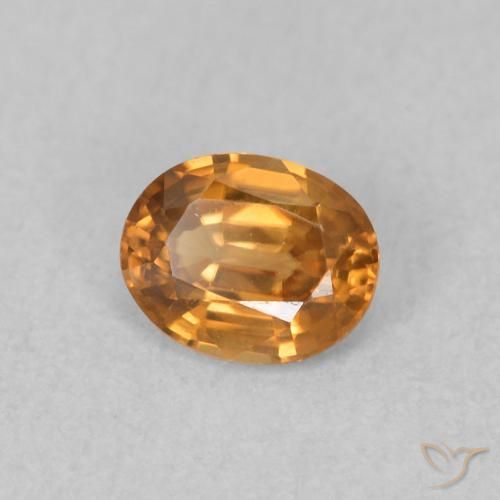 Zircon Orange brun naturelle ovale, 0.61 ct, VVS
