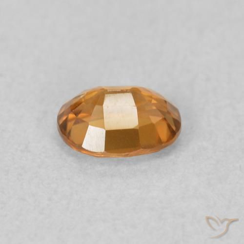 Zircon Orange brun naturelle ovale, 0.61 ct, VVS