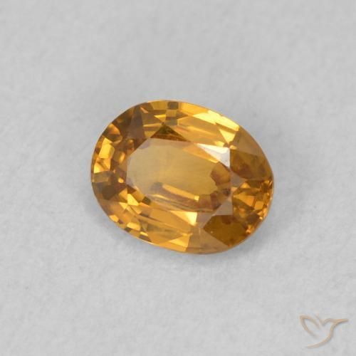 Zircon Orange moyen naturelle ovale, 0.62 ct, VVS
