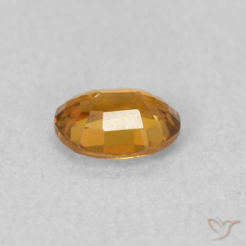 Zircon Orange moyen naturelle ovale, 0.62 ct, VVS