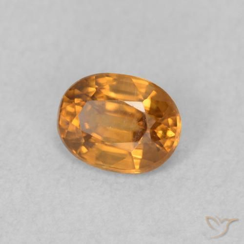 Zircon Orange brun naturelle ovale, 0.64 ct, VVS