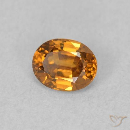Zircon Orange brun naturelle ovale, 0.57 ct, VVS