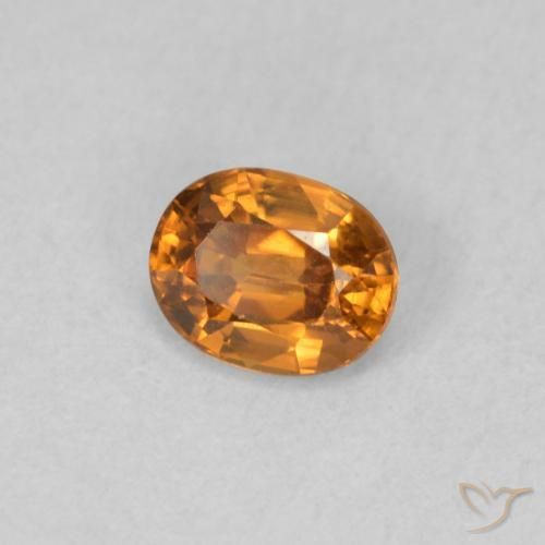 Zircon Orange moyen naturelle ovale, 0.65 ct, VVS
