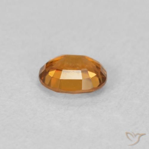 Zircon Orange moyen naturelle ovale, 0.65 ct, VVS