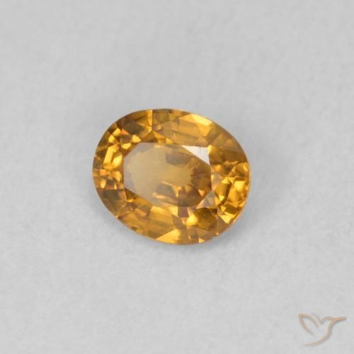 Zircon Orange moyen naturelle ovale, 0.59 ct, VVS