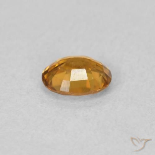 Zircon Orange moyen naturelle ovale, 0.59 ct, VVS