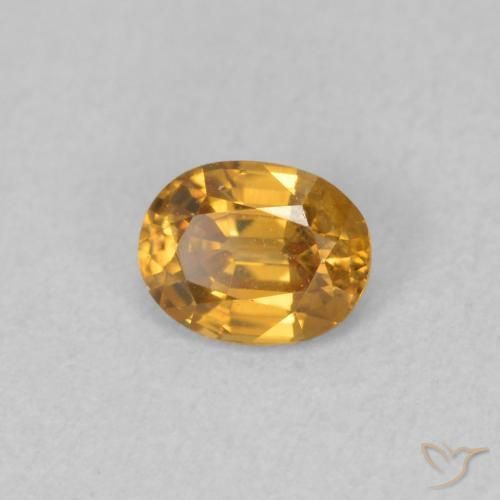 Zircon Orange moyen naturelle ovale, 0.61 ct, VVS