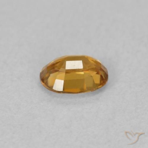 Zircon Orange moyen naturelle ovale, 0.61 ct, VVS