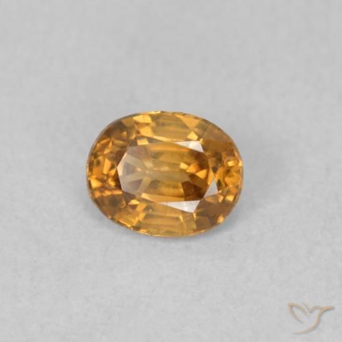 Zircon Orange foncé naturelle ovale, 0.66 ct, VVS