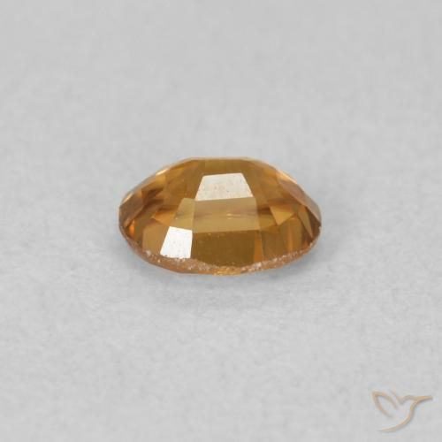 Zircon Orange foncé naturelle ovale, 0.66 ct, VVS