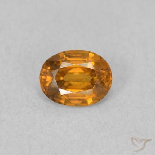 Zircon Orange brunâtre naturelle ovale, 0.59 ct, VVS-VS